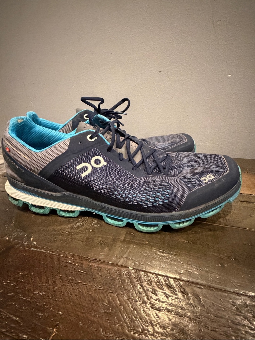On Running Men’s Navy and Teal Athletic Shoes